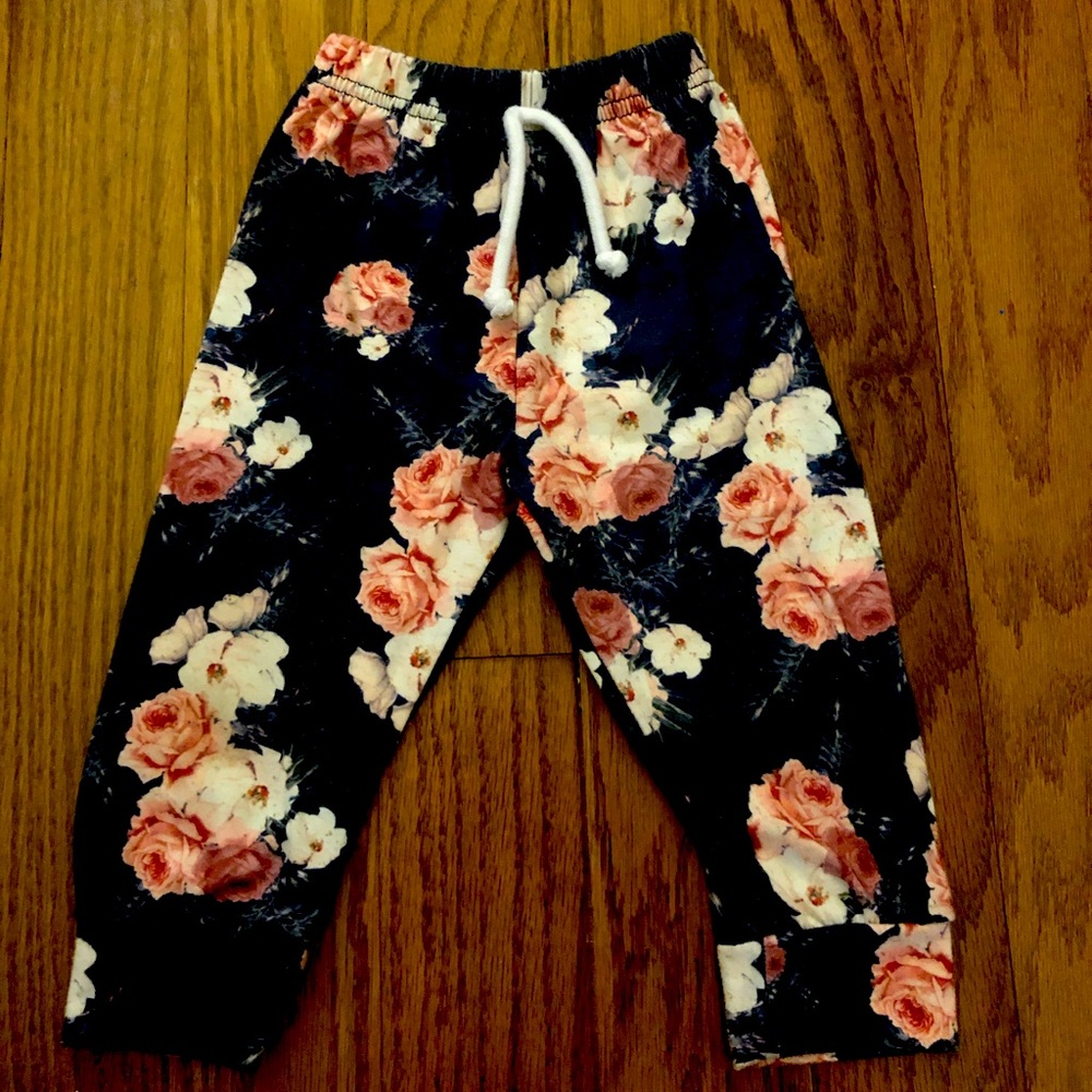 Navy pants with light pink and cream roses